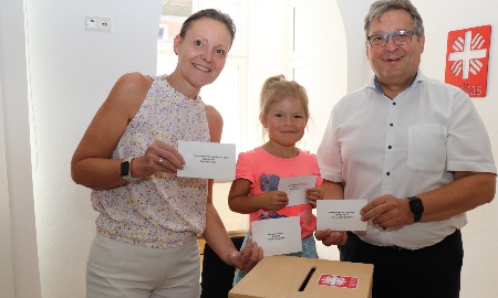 Solidarische Mitarbeiter*innen bei der Caritas