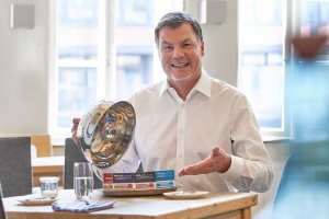 Mit Europameister Thomas Helmer und Gutscheinbuch.de ins Sommermärchen