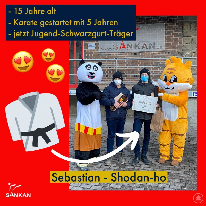 Sebastian Binder erhält sein Dan-Diplom von Panda und Tiger überreicht