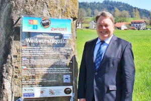 Staatsminister steht auf dem &Auml;quator